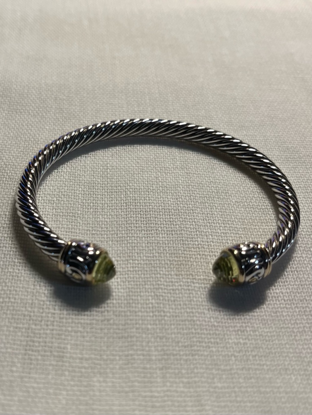 John Madeiras cuff bracket with peridot end stones